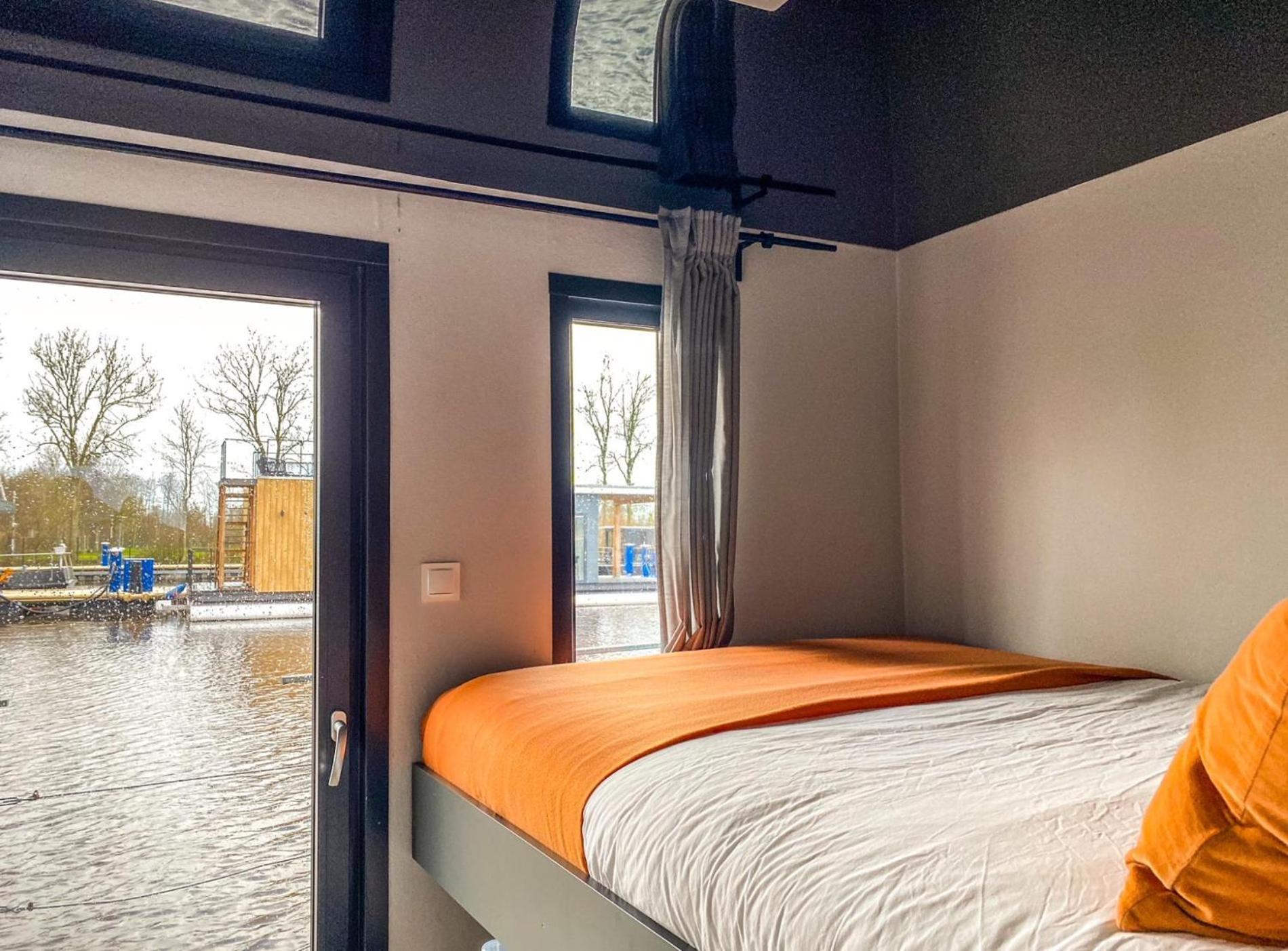 Houseboat Orange Sneekermeer Offingawier 外观 照片